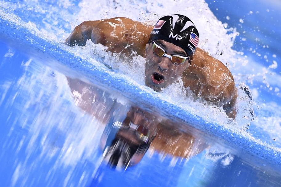 FAME - Michael Phelps: L&#39;atleta pi titolato della storia dei Giochi. Nel nuoto in 5 edizioni ha conquistato 28 medaglie, di cui 23 ori. Afp